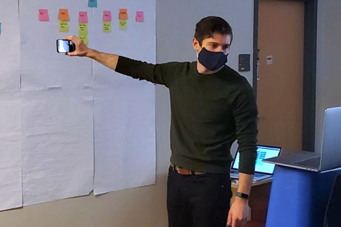 Well21 team at white board
